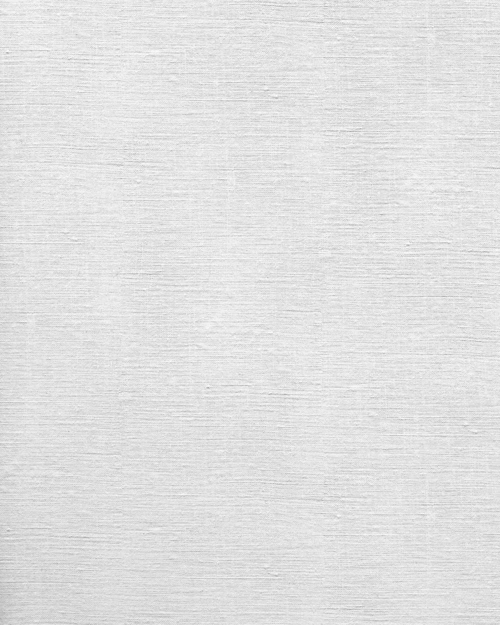 Close-up of a featherlight open-weave fabric in soft light